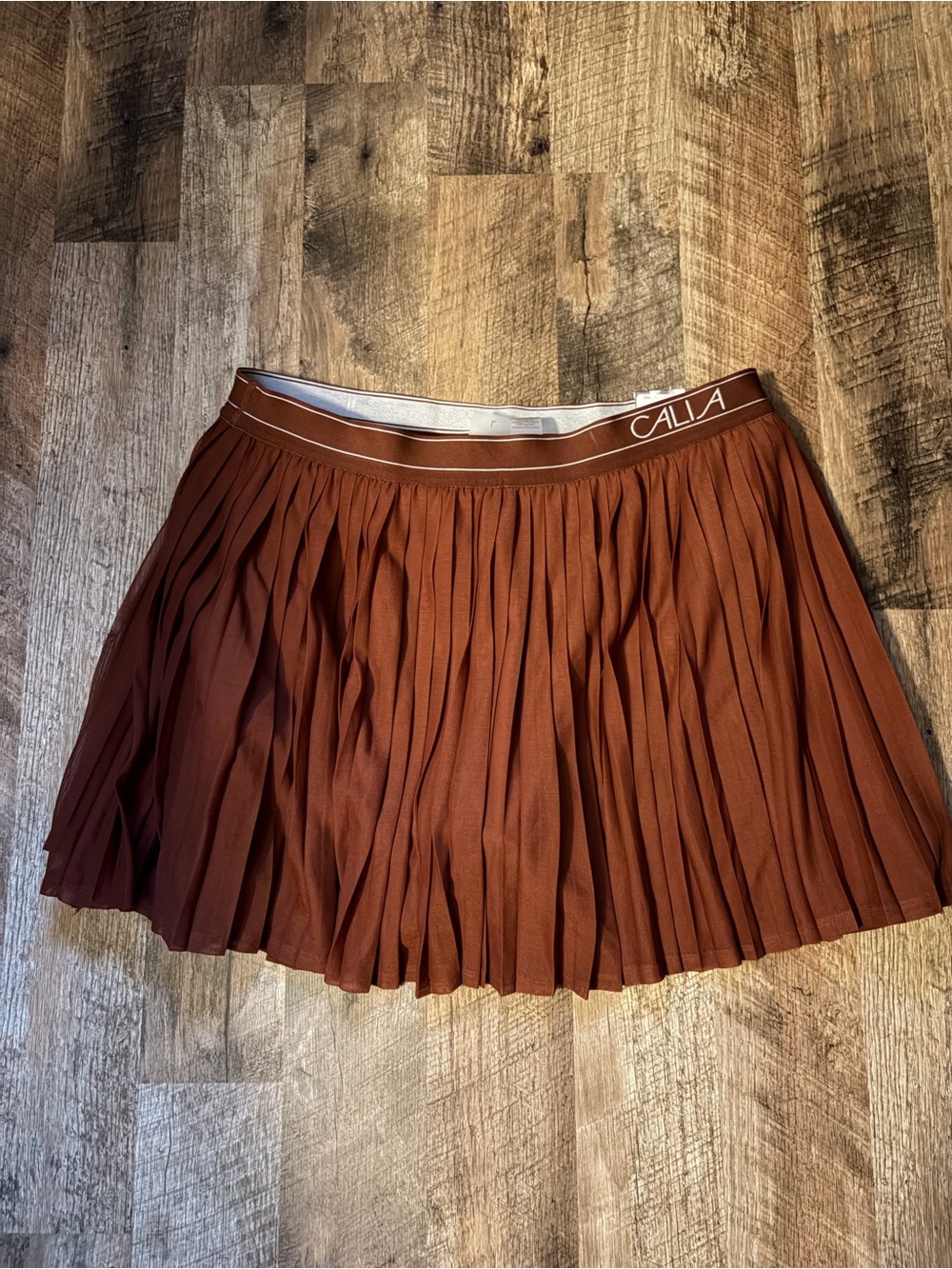 Pleated Calia Golf Skirt in Rust Brown